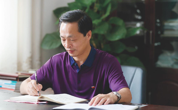 记商城县上桥高中校长丁继章